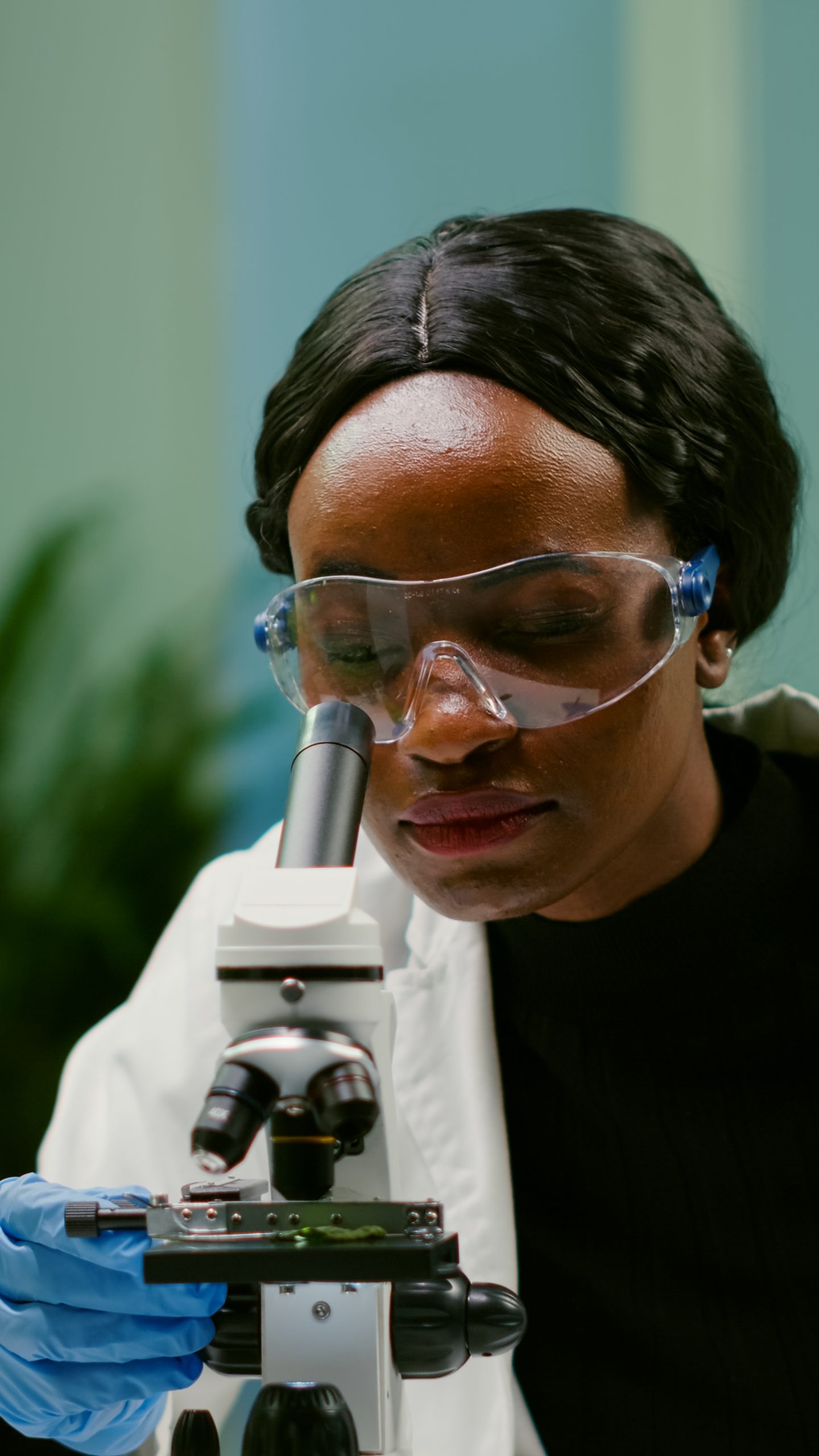A food science researcher working with laboratory samples and equipment